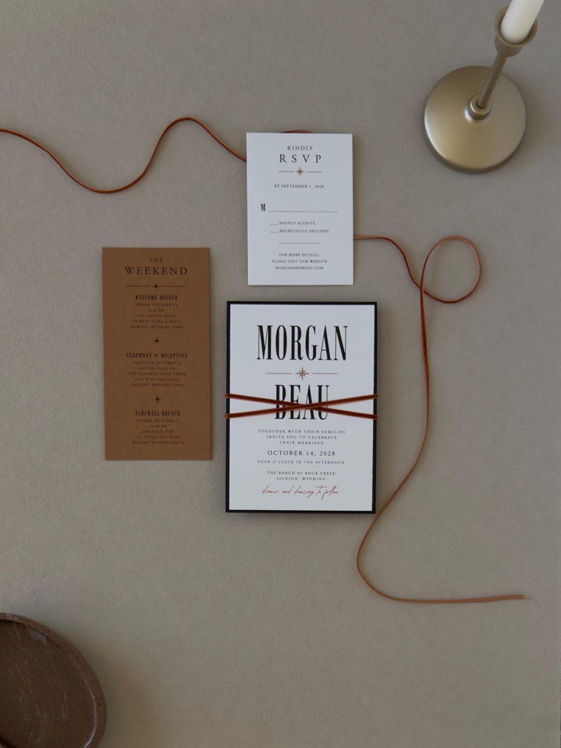 Modern wedding invitation with bold black typography paired with warm rust brown details cards, RSVP card and black stationery from the Whitmore invitation suite.
