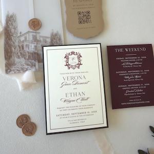 Burgundy wedding invitation suite with patterned envelope liner, vellum wrap and coordinating details card