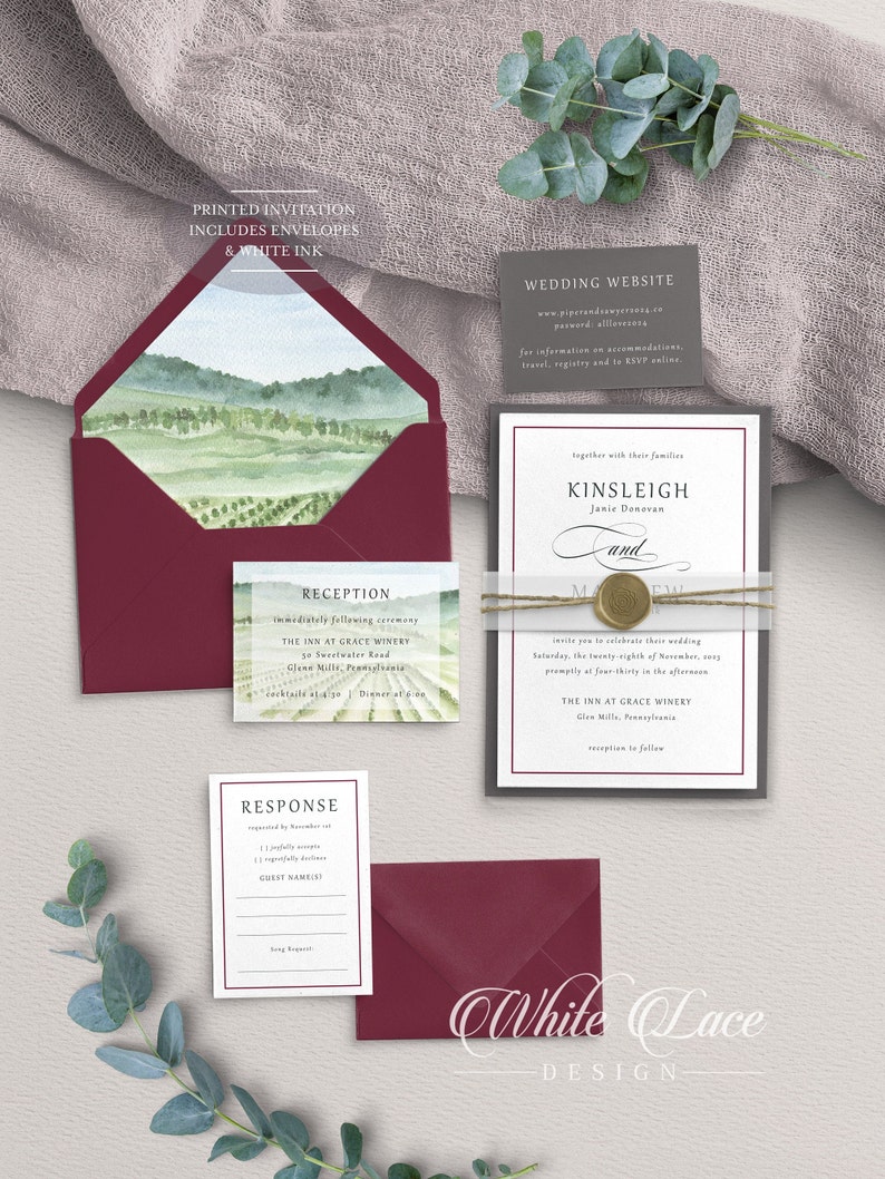 May include: A burgundy wedding invitation suite with a watercolor illustration of a vineyard. The invitation includes the couple's names, Kinsleigh and Janie Donovan, the wedding date, and the location, The Inn at Grace Winery. The reception details are on a separate card. The RSVP card is also included.