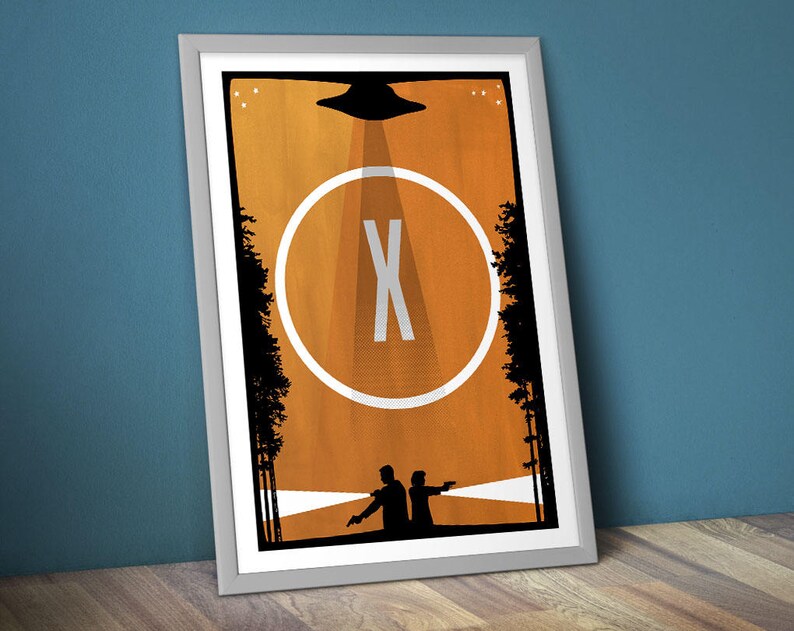 May include: A minimalist poster with a black silhouette of two figures standing in a forest. A white circle with a black "X" in the center is in the middle of the poster. A black silhouette of a flying saucer is at the top of the poster. The background is orange.
