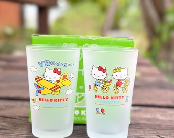 2004 Sanrio Hello Kitty flying a plane Hello Kitty 30th Year water Glasses