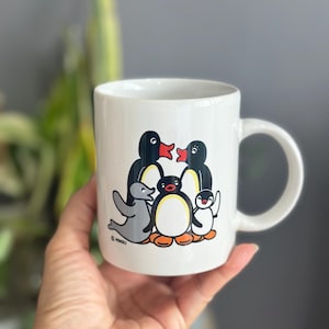 Pingu the Penguin and family mug