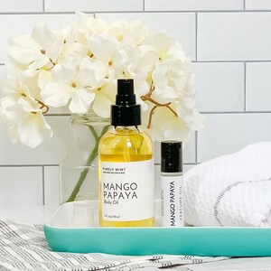Organic Vegan Body Oil: Nut-Free, Sensitive Skin, Natural Moisturizer. Two bottles of mango papaya body oil and perfume oil.