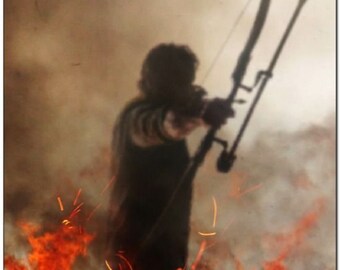 May include: A movie poster for the film "Rambo: Last Blood" featuring Sylvester Stallone as John Rambo, holding a bow and arrow, standing in front of a fiery background. The text "Everyone has one more fight in them" is displayed above the title.