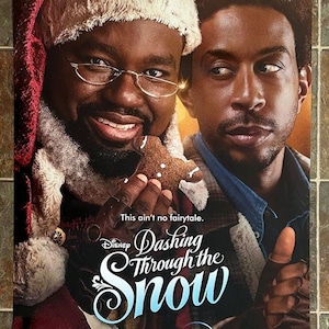 May include: Film poster for "Dashing Through the Snow" with Lil Rel Howery and Chris "Ludacris" Bridges. The poster has a festive theme with a Santa hat and gingerbread man. Text includes "This ain't no fairytale."