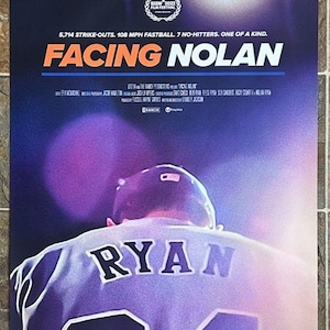 May include: Poster for the film "Facing Nolan" featuring a baseball player's jersey with the name "RYAN" and the number "34". The poster includes text about the player's stats and the SXSW 2022 Film Festival logo.