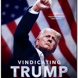 May include: A movie poster for the film "Vindicating Trump" featuring a close-up of Donald Trump with his fist raised in the air. The poster is red, white, and blue with the text "Vindicating Trump" in large white letters. The text "From the creators of "Obama's America" and "2000 Mules" is also featured on the poster.