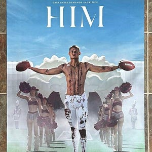 May include: Movie poster for "HIM" featuring a football player with blood-like streaks, holding footballs. The poster includes the text "FROM PRODUCER JORDAN PEELE" and "GREATNESS DEMANDS SACRIFICE". The release date is September 19.