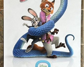 May include: A movie poster for Disney's Zootopia 2. The poster features the number 2 formed by a blue snake, with Judy Hopps the bunny and Nick Wilde the fox. The text "ONLY IN THEATERS NOVEMBER 26" is at the bottom.