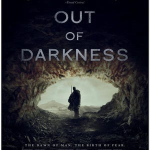 May include: Movie poster for the film "Out of Darkness", a Stone Age survivalist horror film. The poster features a man in a cave with a spear, and the text "The Dawn of Man. The Birth of Fear."