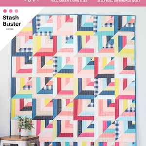 May include: A quilt pattern called "Lucky Log Cabins" from the "Stash Buster" series by Quilty Love. The quilt is made with a variety of colourful fabrics, including pink, blue, yellow, and red. The quilt is displayed on a wall with a small plant and stool in front of it.