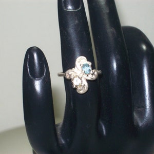 It Kind of Looks Like a butterfly. Brilliant Blue Neatural Apatite and Brazilian Citrine Sterling Silver Ring Size 5