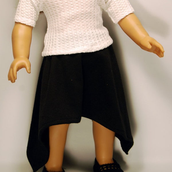 Handcrafted doll clothes designed to fit American girl dolls and other 18-inch dolls.Asymmetrical Skirt, boatneck Raglan Blouse, Elena Shoes