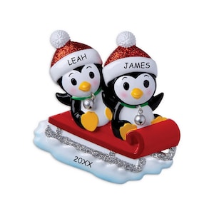 Personalized Penguins On A Sled Couples Christmas Ornament