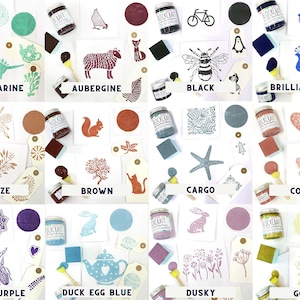 May include: A collection of 12 paint colors with names like Aquamarine, Aubergine, Black, Brilliant Blue, Bronze, Brown, Cargo, Coral, Dark Purple, Duck Egg Blue, Dusky, and Gold. Each color is displayed with a small jar of paint, a paintbrush, a sponge, and a sample of the color on a card with a design.