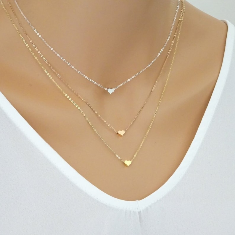 Close-up view of a dainty handmade necklace with heart charm in silver, gold, and rose gold options – a thoughtful and elegant accessory for women, moms, sisters, and bridesmaids.