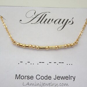 Comes in a gift box with card explaining whats written in Morse code.