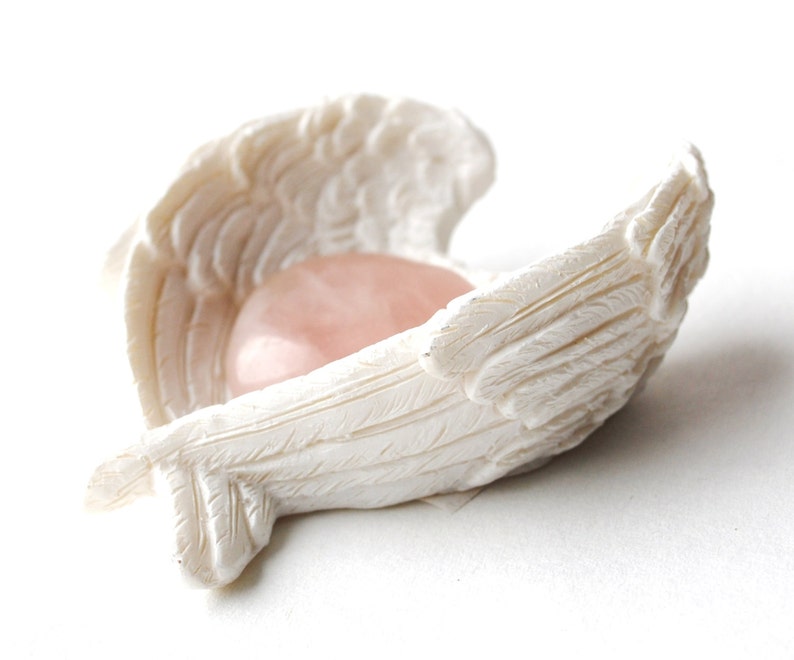 Rose quartz stone in angel wings dish. Come discover 22 Random Lovely Finds & Smiles to Discover!