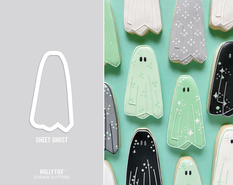 Puede incluir: Un cortador de galletas con forma de fantasma con la parte superior redondeada y la inferior puntiaguda. El cortador es blanco y tiene el texto "SHEET GHOST" debajo. El texto "HOLLY FOX COOKIE CUTTERS" est&aacute; debajo del cortador.