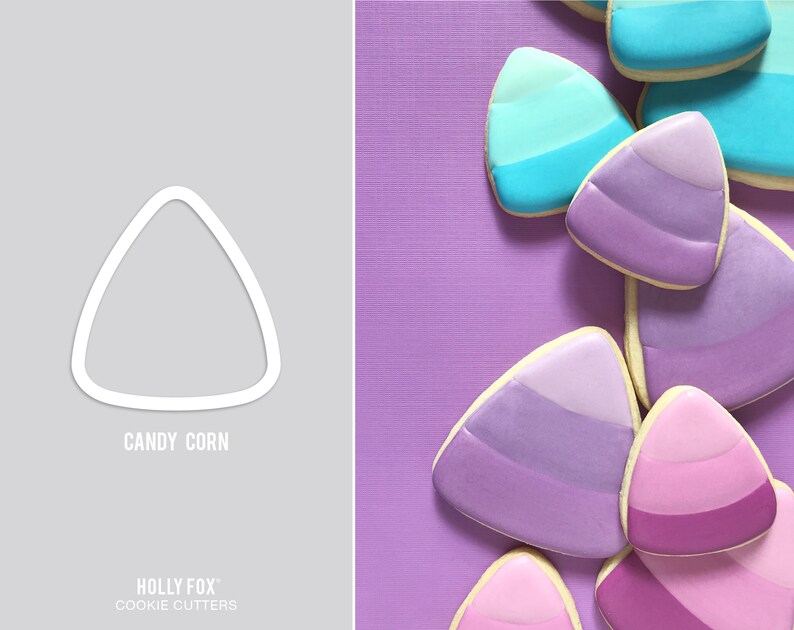 May include: Candy corn cookie cutters, a set of three, in the shape of a candy corn. The cutters are white and are shown on a gray background. The cutters are shown next to a purple background with several cookies decorated to look like candy corn.