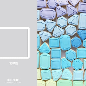 May include: A set of cookie cutters in the shape of various gemstones. The cutters are arranged in a gradient of blue and purple colors. The cutters are labeled "HOLLY FOX COOKIE CUTTERS" and "SQUARE".