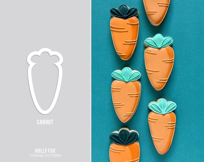 May include: Orange carrot-shaped biscuits with green and dark green accents are arranged on a teal background. A white carrot-shaped cookie cutter is on the left. The word "CARROT" is below the cutter. "HOLLY FOX COOKIE CUTTERS" is below the word "CARROT".