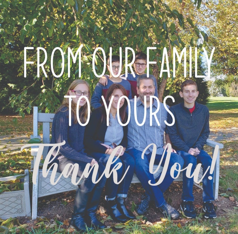 May include: A family of five poses for a photo on a wooden bench in front of a green grassy area. The family is smiling and looking at the camera. The text "From our family to yours, Thank You!" is written in white letters on a light gray background.