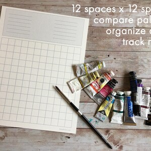 May include: A white gridded paper with 12 spaces by 12 spaces, a paintbrush, and a collection of paint tubes. The text on the paper reads "12 spaces x 12 spaces compare palettes organize color track mixes".