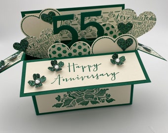 Biglietto pop-up per il 55° anniversario di Emerald: cuori, fiori e glitter