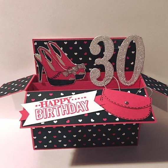 red heels and clutch bag