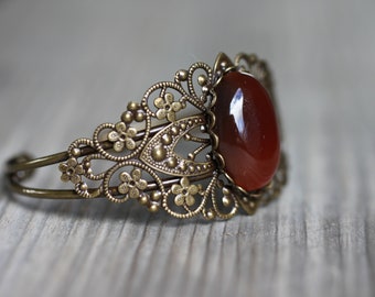 Bronze bangle with large gemstone cabochon agate red boho unique vintage look boho jewelry hippie