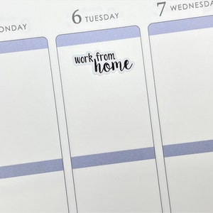 May include: A white planner with a blue stripe across the top of each day. The day "Tuesday" is highlighted with a sticker that says "work from home" in black cursive writing.