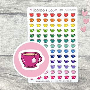 Puede incluir: Una hoja de pegatinas de tazas de té de colores con una sola pegatina en un círculo rosa. La pegatina de la taza de té es rosa con una bolsita de té marrón.