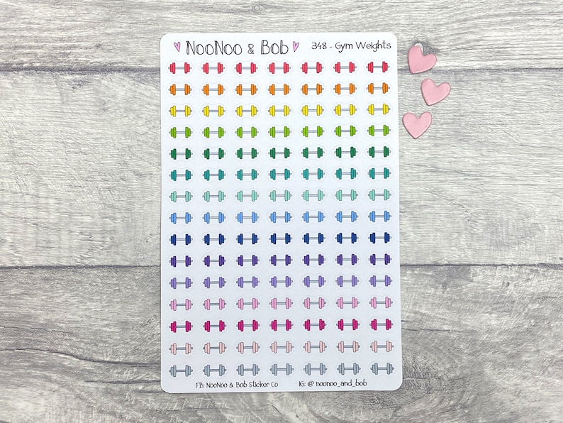 May include: A sheet of 348 colorful dumbbell stickers. The stickers are arranged in rows and columns on a white background. The dumbbells are outlined in black and filled with a rainbow of colors.