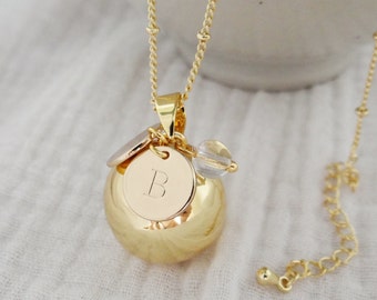 Personalized gold pregnancy bola. Engraved medal with parents' initials. Lithotherapy stone bead.