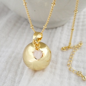 Gold pregnancy bola, rose quartz heart pendant