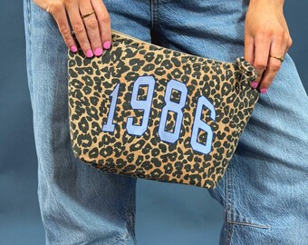 Bolsa de maquillaje personalizada con estampado de leopardo del año universitario