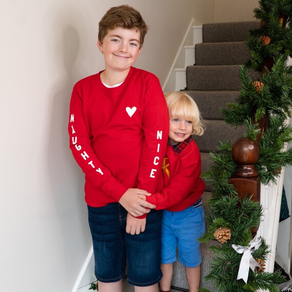 Children s Slogan Christmas Jumper Naughty or Nice Christmas