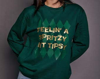 Sudadera navideña con el eslogan Spritzy Bit Tipsy
