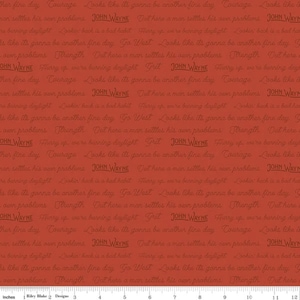 May include: Red fabric with a repeating pattern of handwritten text in brown. The text includes quotes from John Wayne, such as "Looks like it's gonna be another fine day" and "Out here a man settles his own problems".