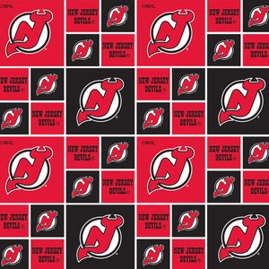 May include: A repeating pattern featuring the New Jersey Devils logo and team name. The design alternates between red and black squares, with the logo and text in white and red. The text "NEW JERSEY DEVILS" is also present.
