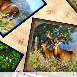 May include: Fabric featuring a collage of deer in natural settings, including a buck with large antlers and a doe in tall grass, interspersed with tan sections displaying deer hoof prints and a ruler along the bottom edge for scale.