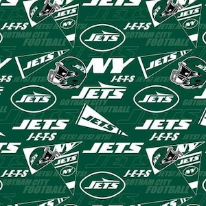 May include: A green and white fabric with a repeating pattern of the New York Jets logo, the team's name, and the words "Gotham City Football".