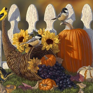 May include: A woven cornucopia overflowing with sunflowers, dark grapes, and small pumpkins sits before a white picket fence. A yellow goldfinch, a black-capped chickadee, and a black and yellow swallowtail butterfly are present.