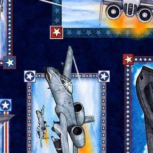 May include: A fabric print featuring gray military aircraft in flight against a dark blue background. The design includes vertical borders with red, white, and blue stripes, along with white star icons set within red and blue square frames.