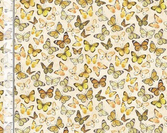 May include: A fabric pattern featuring numerous yellow and orange butterflies on a light beige background, with a vertical and horizontal ruler along the edges showing measurements in inches.