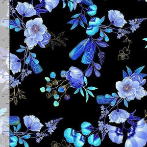 May include: A black fabric featuring a floral pattern with shades of blue, light blue, and white flowers, accompanied by green leaves and gold-colored line art stems. A ruler along the left edge shows a scale of 10 inches for size reference.