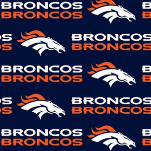 May include: A dark blue fabric featuring a repeating pattern of the Denver Broncos logo, which depicts a white horse head with an orange mane, alongside the word BRONCOS printed in white and orange text in a bold, sans-serif typeface.