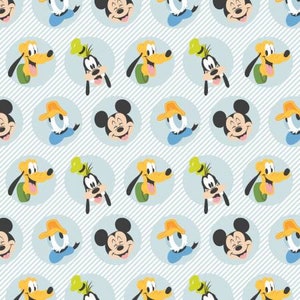 May include: A seamless pattern featuring cartoon characters from Disney. The pattern includes Mickey Mouse, Goofy, and Pluto. The characters are depicted in a variety of poses and expressions. The background is a light blue with white stripes.