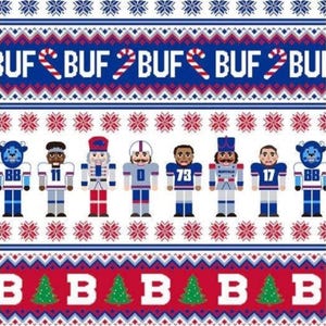 May include: A fabric pattern featuring horizontal bands with a repeating "BUF" text and candy cane motif, a central row of illustrated football players and nutcrackers, and a bottom band with the letter "B" and green Christmas tree icons.